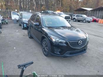  Salvage Mazda Cx