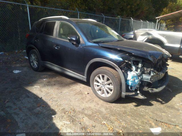  Salvage Mazda Cx