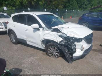  Salvage Mazda Cx